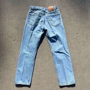 Vintage 90s Levi’s 505 Regular Fit Straight Leg Light Blue Jeans worn in 32x30